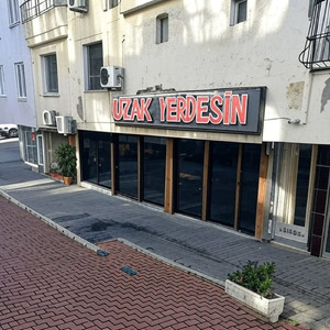 Uzak Yerdesin