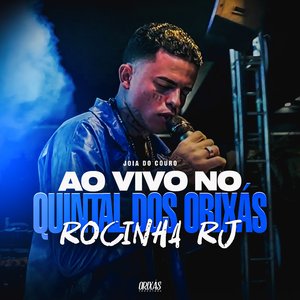 Na casa de Exu / Ô Padilha, ô Mulambo / É um Mavile, é Mavambo / Seu Tranca Rua dá uma volta lá fora / Tranca Ruas Dono do Meu Caminho