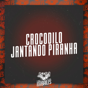 Crocodilo Jantando Piranha