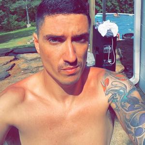 70s porn star with a stache