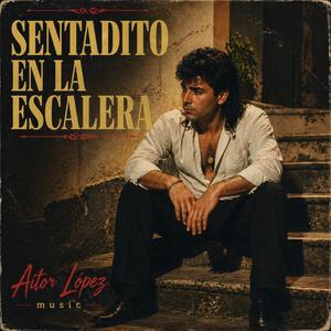 Sentadito en la escalera