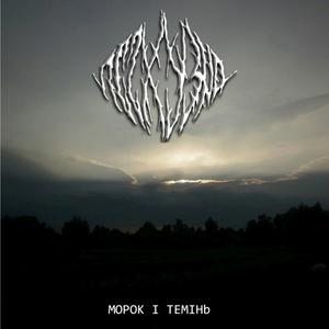 Вона біля вікна