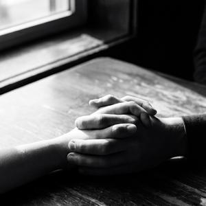 Hands intertwined