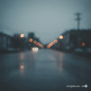 Rain taps lightly on the glass