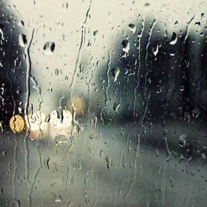 Stepping On The Rainy Street