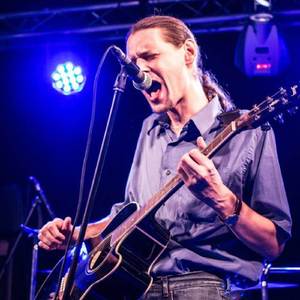 З келихом вина