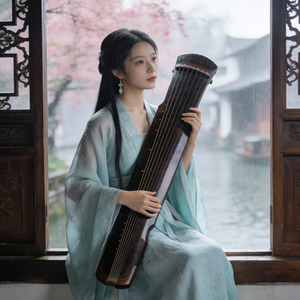 且借人间二两墨