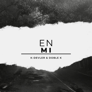 En mi