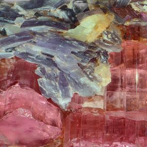 her breath white in the glow of the firelight