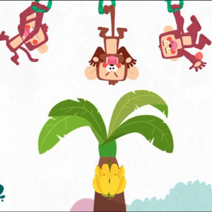 Anak Monyet Melompat Memakan Pisang