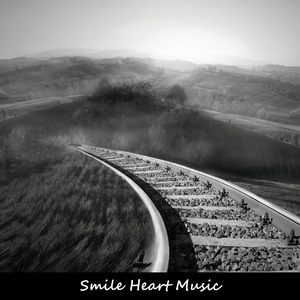 憧れの街へ続く線路沿いの道
