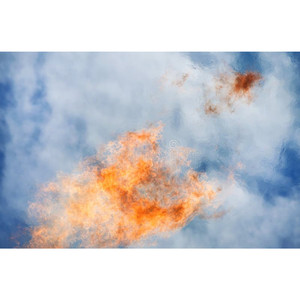 A Raw Flame Reaching Out Towards The Sun