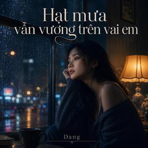 Hạt mưa vẫn vương trên vai em