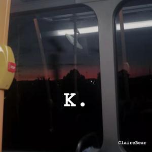 K.