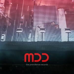 M.D.D.