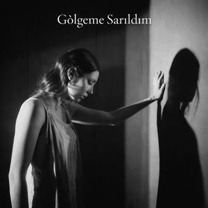 Gölgeme Sarıldım