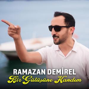 BİR GÜLÜŞÜNE KANDIM