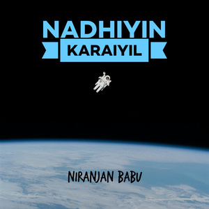 Nadhiyin Karaiyil