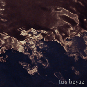 Tuş Beyaz