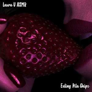 Laura V Eating Pita Chips