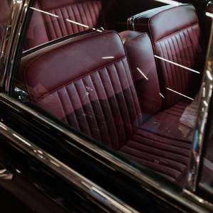 IN BETWEEN THE SEATS