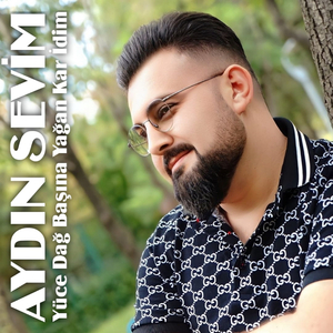 Yüce Dağ Başına Yağan Kar İdim