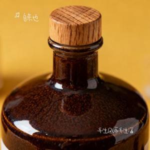 半生风雨半生酒