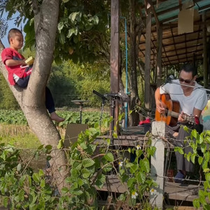 เด็กน้อยกับพิณ (พ่อลูกไปโรงเรียน)