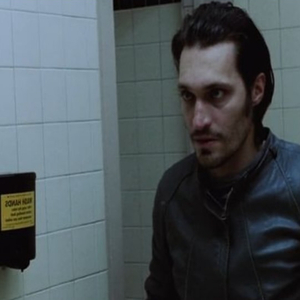 WallsMonolithicbeastsofburdenTheyrisecoldmercilessconfiningusintheiroppressivegripTheirbrutaltexturetearsatfleshgrindingdownouressenceTheyloomcastingshadowsswallowingcriessentientbehemothswithcrackedpulsatingfacades