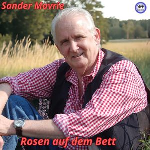 Rosen auf dem Bett