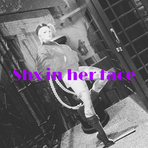 Shx in her face